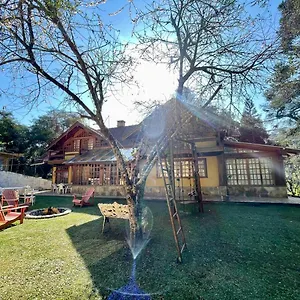 Quarto em Acomodações Particulares Suítes Monte Belo